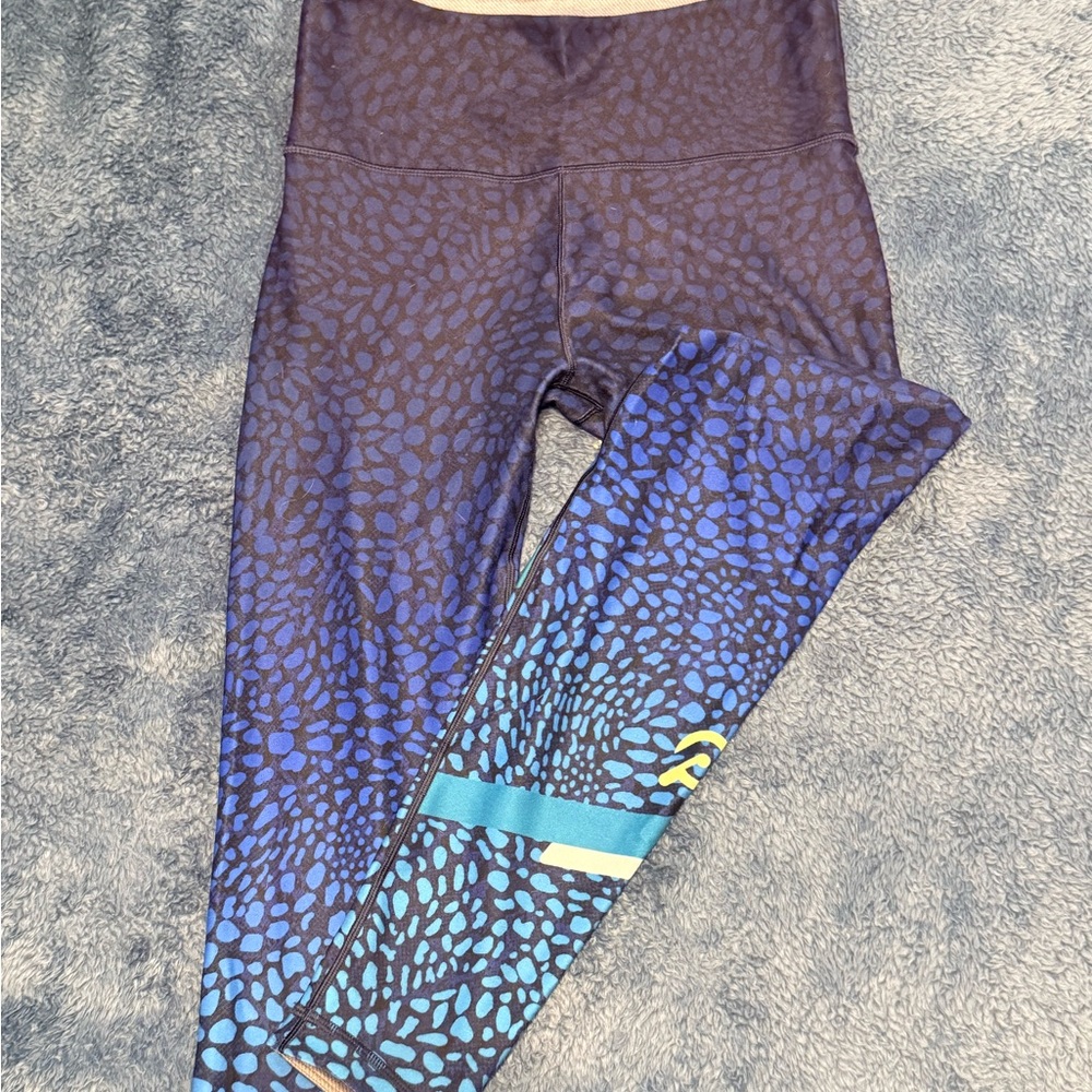 Peloton x Wear it to Heart Blue and Purple Leopard Leggings